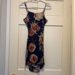 Short spaghetti strap dress with cut out back